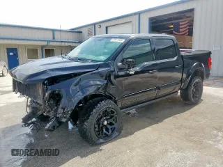 2021 Ford F-150 XL with VIN 1FTFW1E5XMFB70288, listed as a Copart auction lot 87917535 with 35,111 mi miles and Salvage title. Bid and sale history available at DreamBid. Image 1.