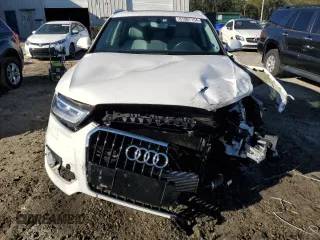 2015 Audi Q3 Premium Plus with VIN WA1BFCFS7FR014199, listed as a Copart auction lot 81987154 with 62,071 mi miles and Salvage title. Bid and sale history available at DreamBid. Image 5.