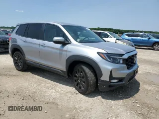 2023 Honda Passport EX-L z VIN 5FNYF8H55PB036004, wystawiony jako Copart lot #59042045 z przebiegiem 9 083 mil mil oraz Szkoda całkowita • Salvage title. Historia ofert i sprzedaży dostępna na DreamBid. Obrazek 4.