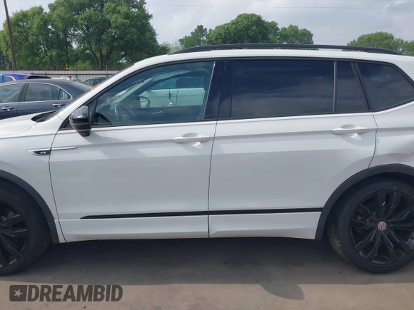 2021 Volkswagen Tiguan SE with VIN 3VV3B7AX9MM003432, listed as a IAAI auction lot 41914477 with 64,530 mi miles and . Bid and sale history available at DreamBid. Image 15.