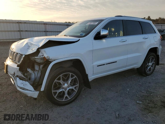 2019 Jeep Grand Cherokee Overland with VIN 1C4RJFCG4KC815786, listed as a Copart auction lot 49697865 with 171,655 mi miles and Salvage Title. Bid and sale history available at carsss.com. Image 1.