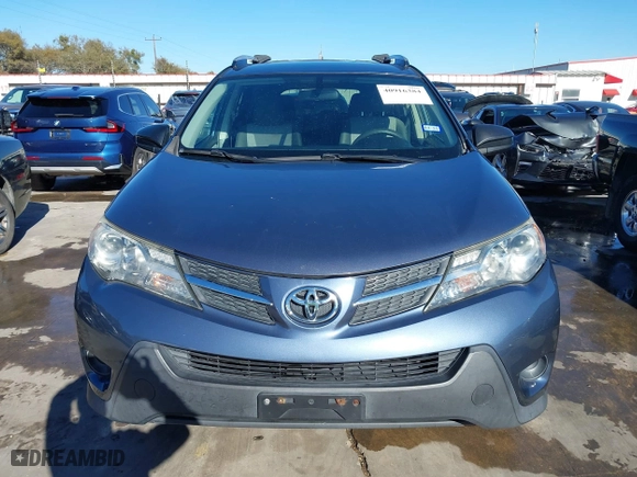 2014 Toyota RAV4 LE with VIN JTMZFREVXED029505, listed as a IAAI auction lot 40916384 with 142,408 mi miles. Bid and sale history available at carsss.com. Image 12.