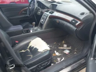 2005 Acura RL z VIN JH4KB16545C015150, wystawiony jako IAAI lot #42126296 z przebiegiem 179 788 mil mil oraz . Historia ofert i sprzedaży dostępna na DreamBid. Obrazek 5.