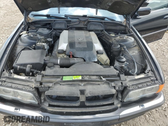 2000 BMW 7 Series 740iL with VIN WBAGH8345YDP12753, listed as a Copart auction lot 56786345 with 130,636 mi miles and Clean title. Bid and sale history available at DreamBid. Image 11.