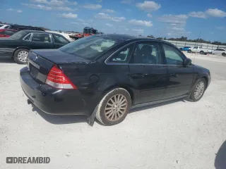 2006 Mercury Montego Premier with VIN 1MEFM42136G606032, listed as a Copart auction lot 77151964 with 0 mi miles and Salvage Title. Bid and sale history available at carsss.com. Image 3.