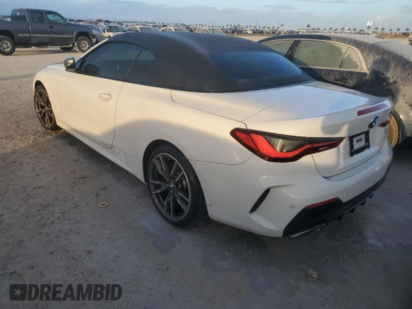 2022 BMW 4 Series M440i with VIN WBA53AT06NCK03623, listed as a Copart auction lot 76490964 with Not provided miles and Salvage title. Bid and sale history available at DreamBid. Image 2.