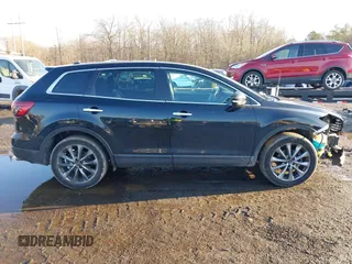 2014 Mazda CX-9 Grand Touring with VIN JM3TB3DV4E0444558, listed as a IAAI auction lot 41538130 with 113,050 mi miles and . Bid and sale history available at DreamBid. Image 13.