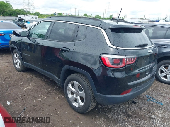 2017 Jeep Compass Latitude with VIN 3C4NJCBB3HT653021, listed as a IAAI auction lot 42263281 with 91,076 mi miles and . Bid and sale history available at DreamBid. Image 3.