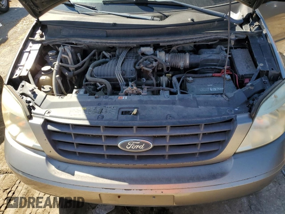2006 Ford Freestar SE z VIN 2FMZA51696BA52749, wystawiony jako Copart lot #73174604 z przebiegiem 288 365 mil mil oraz Szkody całkowita. Historia ofert i sprzedaży dostępna na DreamBid. Obrazek 12.