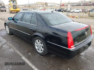 2006 Cadillac DTS w/1SC with VIN 1G6KD57Y96U251691, listed as a IAAI auction lot 41086147 with 128,959 mi miles. Bid and sale history available at carsss.com. Image 14.