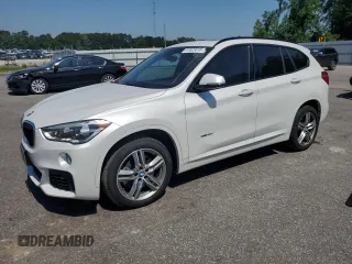2018 BMW X1 xDrive28i z VIN WBXHT3C30J5K29982, wystawiony jako Copart lot #61623015 z przebiegiem 103 043 mil mil oraz Szkoda całkowita • Salvage title. Historia ofert i sprzedaży dostępna na DreamBid. Obrazek 1.