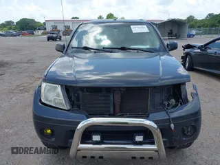 2014 Nissan Frontier SV z VIN 1N6AD0ER9EN751010, wystawiony jako IAAI lot #42326309 z przebiegiem 199 871 mil mil oraz . Historia ofert i sprzedaży dostępna na DreamBid. Obrazek 12.