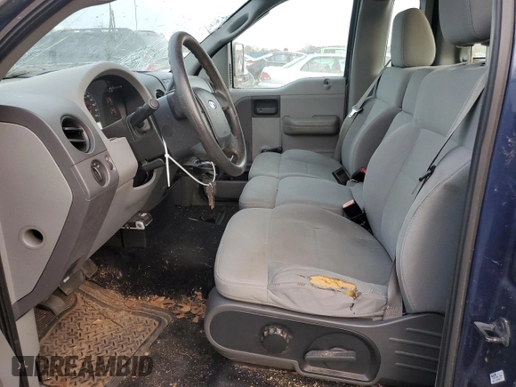 2007 Ford F-150 STX with VIN 1FTRF02267KB67255, listed as a Copart auction lot 78795584 with 166,024 mi miles and Salvage Title. Bid and sale history available at carsss.com. Image 7.