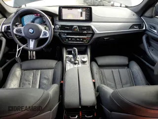 2023 BMW 5 Series M550i xDrive with VIN WBA13BK0XPCM98878, listed as a Copart auction lot 45580685 with 10,866 mi miles and Salvage title. Bid and sale history available at DreamBid. Image 8.