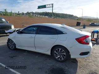 2017 Honda Civic EX z VIN 2HGFC2F76HH573639, wystawiony jako IAAI lot #41807311 z przebiegiem 140 431 mil mil oraz . Historia ofert i sprzedaży dostępna na DreamBid. Obrazek 14.