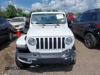 2018 Jeep Wrangler Unlimited Sahara with VIN 1C4HJXEG1JW205789, listed as a IAAI auction lot 42435877 with 57,587 mi miles and . Bid and sale history available at DreamBid. Image 13.