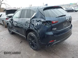 2022 Mazda CX-5 2.5 Turbo with VIN JM3KFBAY8N0635618, listed as a IAAI auction lot 41199038 with Not Provided miles and . Bid and sale history available at carsss.com. Image 3.