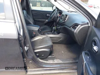 2021 Jeep Cherokee Latitude Lux with VIN 1C4PJMMX0MD235006, listed as a IAAI auction lot 42230915 with 76,264 mi miles and . Bid and sale history available at DreamBid. Image 5.