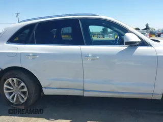 2015 Audi Q5 Premium Plus with VIN WA1LFAFP6FA096946, listed as a IAAI auction lot 41956824 with 97,328 mi miles and . Bid and sale history available at DreamBid. Image 14.