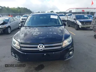 2012 Volkswagen Tiguan SE z VIN WVGAV7AX7CW504391, wystawiony jako IAAI lot #42240604 z przebiegiem 180 330 mil mil oraz . Historia ofert i sprzedaży dostępna na DreamBid. Obrazek 12.