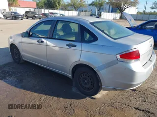 2009 Ford Focus S with VIN 1FAHP34N79W221813, listed as a IAAI auction lot 41758471 with 248,531 mi miles. Bid and sale history available at carsss.com. Image 3.
