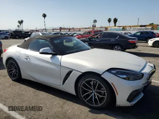 2022 BMW Z4 sDrive30i with VIN WBAHF3C02NWX82592, listed as a Copart auction lot 54182084 with 26,809 mi miles. Bid and sale history available at carsss.com. Image 4.