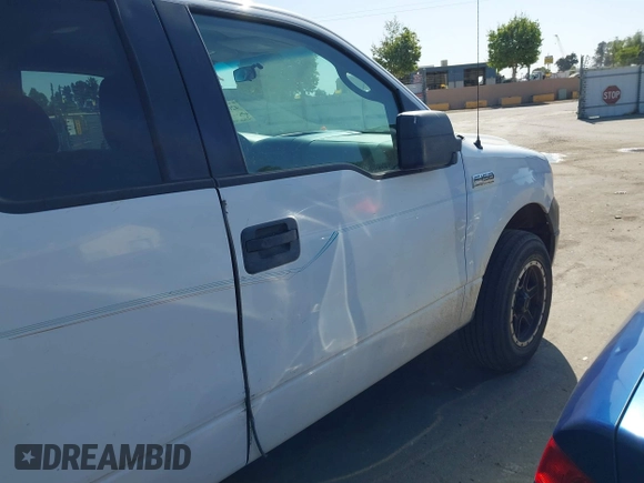 2007 Ford F-150 XLT with VIN 1FTPX14527KD42148, listed as a IAAI auction lot 42077816 with 267,360 mi miles. Bid and sale history available at carsss.com. Image 15.