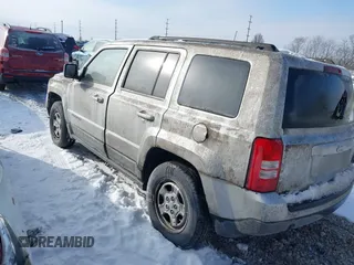 2011 Jeep Patriot Latitude with VIN 1J4NT1GBXBD289758, listed as a IAAI auction lot 41301702 with 215,068 mi miles. Bid and sale history available at carsss.com. Image 3.