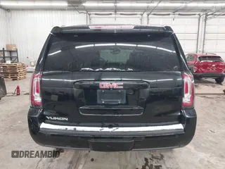 2016 GMC Yukon SLT with VIN 1GKS2BKC9GR176948, listed as a IAAI auction lot 41361221 with 125,178 mi miles. Bid and sale history available at carsss.com. Image 17.