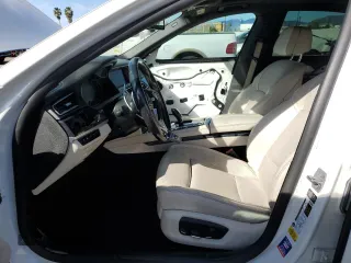2014 BMW 7 Series 750i с VIN WBAYA8C56ED825303, выставлен на аукционе Copart как лот 46189695 с пробегом 77 573 миль миль и Списание • Salvage title. История ставок и продаж доступна на DreamBid. Изображение 7.