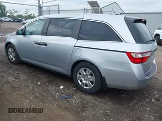 2011 Honda Odyssey LX with VIN 5FNRL5H25BB040287, listed as a IAAI auction lot 42456679 with 129,176 mi miles and . Bid and sale history available at DreamBid. Image 3.
