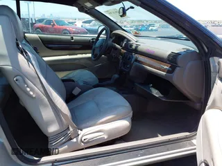2004 Chrysler Sebring Limited z VIN 1C3EL65R94N150421, wystawiony jako IAAI lot #42614705 z przebiegiem 75 610 mil mil oraz . Historia ofert i sprzedaży dostępna na DreamBid. Obrazek 5.