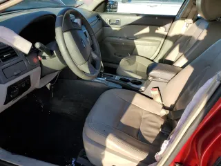 2012 Ford Fusion SEL with VIN 3FAHP0JG1CR265885, listed as a Copart auction lot 48516675 with 142,258 mi miles and Salvage Title. Bid and sale history available at DreamBid. Image 7.