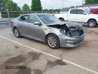 2016 Kia Optima EX with VIN 5XXGU4L31GG001280, listed as a IAAI auction lot 42100841 with 155,409 mi miles and . Bid and sale history available at DreamBid. Image 1.