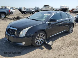 2016 Cadillac XTS Luxury Collection with VIN 2G61M5S36G9153238, listed as a Copart auction lot 52134695 with 166,943 mi miles and Clean Title. Bid and sale history available at carsss.com. Image 1.
