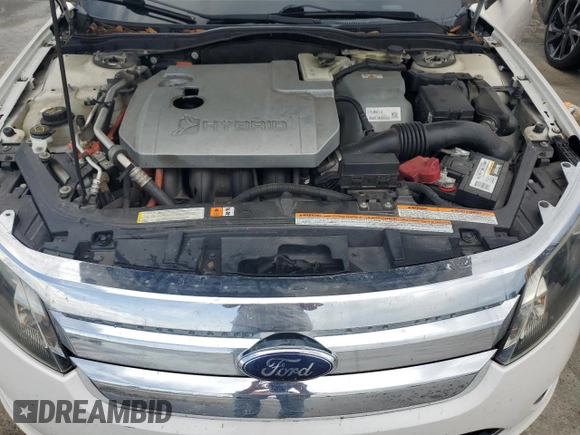 2010 Ford Fusion Hybrid z VIN 3FADP0L34AR186085, wystawiony jako Copart lot #55291735 z przebiegiem 282 029 mil mil oraz Szkody całkowita. Historia ofert i sprzedaży dostępna na DreamBid. Obrazek 11.
