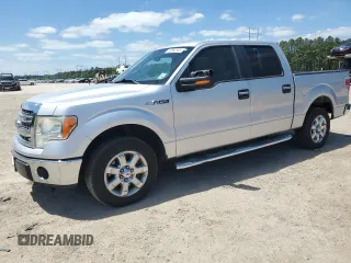 2013 Ford F-150 XL with VIN 1FTFW1CF1DKF83235, listed as a Copart auction lot 52860165 with 119,383 mi miles and Salvage Title. Bid and sale history available at carsss.com. Image 1.