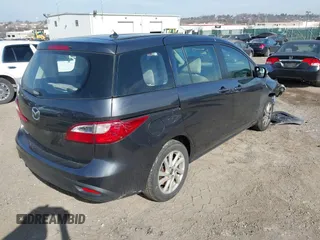2013 Mazda 5 Sport z VIN JM1CW2BL3D0155694, wystawiony jako IAAI lot #41641169 z przebiegiem Nie podano mil oraz . Historia ofert i sprzedaży dostępna na DreamBid. Obrazek 4.