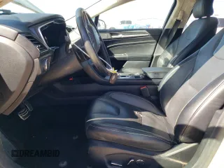 2018 Ford Fusion Titanium с VIN 3FA6P0D93JR207164, выставлен на аукционе Copart как лот 47274035 с пробегом 109 632 миль миль и Чистый • Clean title. История ставок и продаж доступна на DreamBid. Изображение 7.