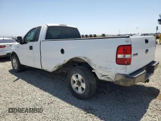 2005 Ford F-150 XL with VIN 1FTRF12255NB53669, listed as a Copart auction lot 61636135 with 156,562 mi miles and Salvage title. Bid and sale history available at DreamBid. Image 2.