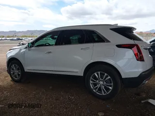 2021 Cadillac XT5 FWD Premium Luxury with VIN 1GYKNCRS5MZ224957, listed as a IAAI auction lot 41794648 with 28,540 mi miles and . Bid and sale history available at carsss.com. Image 14.