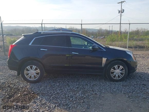 2014 Cadillac SRX Luxury Collection with VIN 3GYFNEE32ES610813, listed as a IAAI auction lot 42098401 with 112,000 mi miles. Bid and sale history available at carsss.com. Image 13.