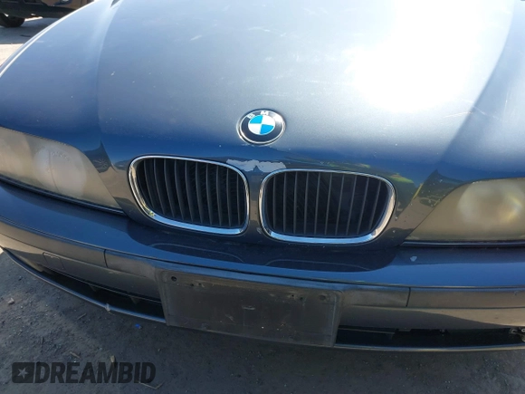 2000 BMW 5 Series 528iA with VIN WBADM6343YGV01651, listed as a IAAI auction lot 41745574 with 143,898 mi miles. Bid and sale history available at carsss.com. Image 6.
