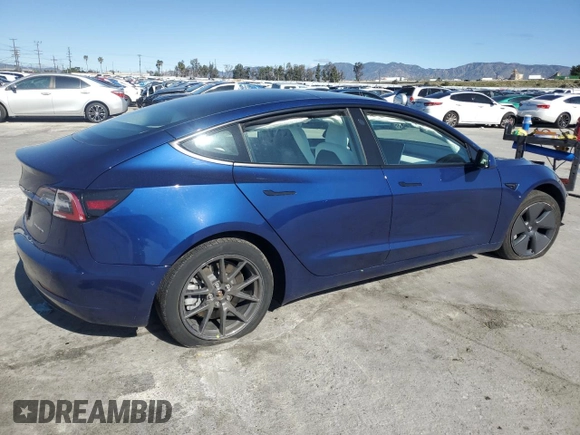 2022 Tesla Model 3 Long Range with VIN 5YJ3E1EB2NF243381, listed as a Copart auction lot 48917265 with 25,865 mi miles and Salvage Title. Bid and sale history available at DreamBid. Image 3.