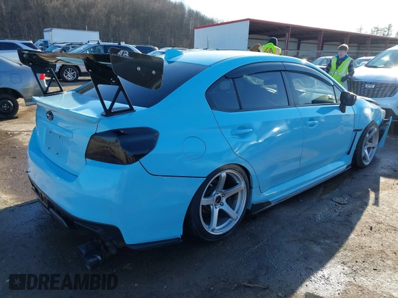 2016 Subaru WRX with VIN JF1VA1B61G9826975, listed as a IAAI auction lot 41511402 with 86,000 mi miles. Bid and sale history available at carsss.com. Image 4.