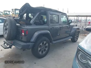 2018 Jeep Wrangler Unlimited Sahara z VIN 1C4HJXEG5JW194523, wystawiony jako IAAI lot #42056557 z przebiegiem 71 141 mil mil oraz . Historia ofert i sprzedaży dostępna na DreamBid. Obrazek 4.