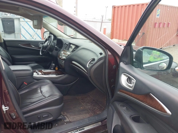 2015 Infiniti QX60 with VIN 5N1AL0MM7FC521700, listed as a IAAI auction lot 42310389 with 144,217 mi miles and . Bid and sale history available at DreamBid. Image 5.