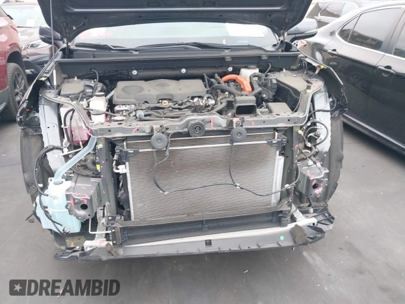 2023 Toyota RAV4 Hybrid XLE Premium with VIN 4T3B6RFV9PU117919, listed as a IAAI auction lot 42528322 with 27,236 mi miles and . Bid and sale history available at DreamBid. Image 6.