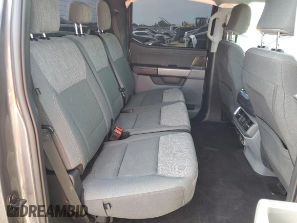 2023 Ford F-150 Lightning Pro z VIN 1FTVW1EL8PWG36508, wystawiony jako Copart lot #54178165 z przebiegiem 18 928 mil mil oraz Szkoda całkowita • Salvage title. Historia ofert i sprzedaży dostępna na DreamBid. Obrazek 10.