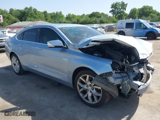 2014 Chevrolet Impala LTZ with VIN 1G1145SLXEU107952, listed as a IAAI auction lot 39595744 with 151,217 mi miles. Bid and sale history available at carsss.com. Image 1.